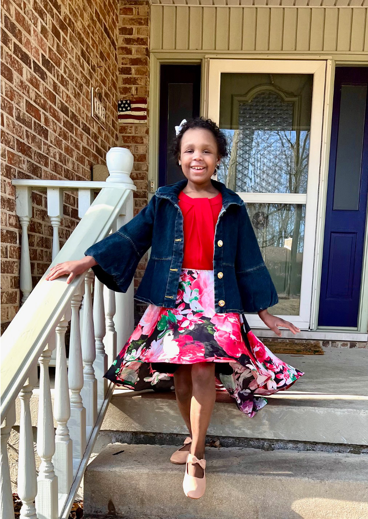 Girl smiling on stairs