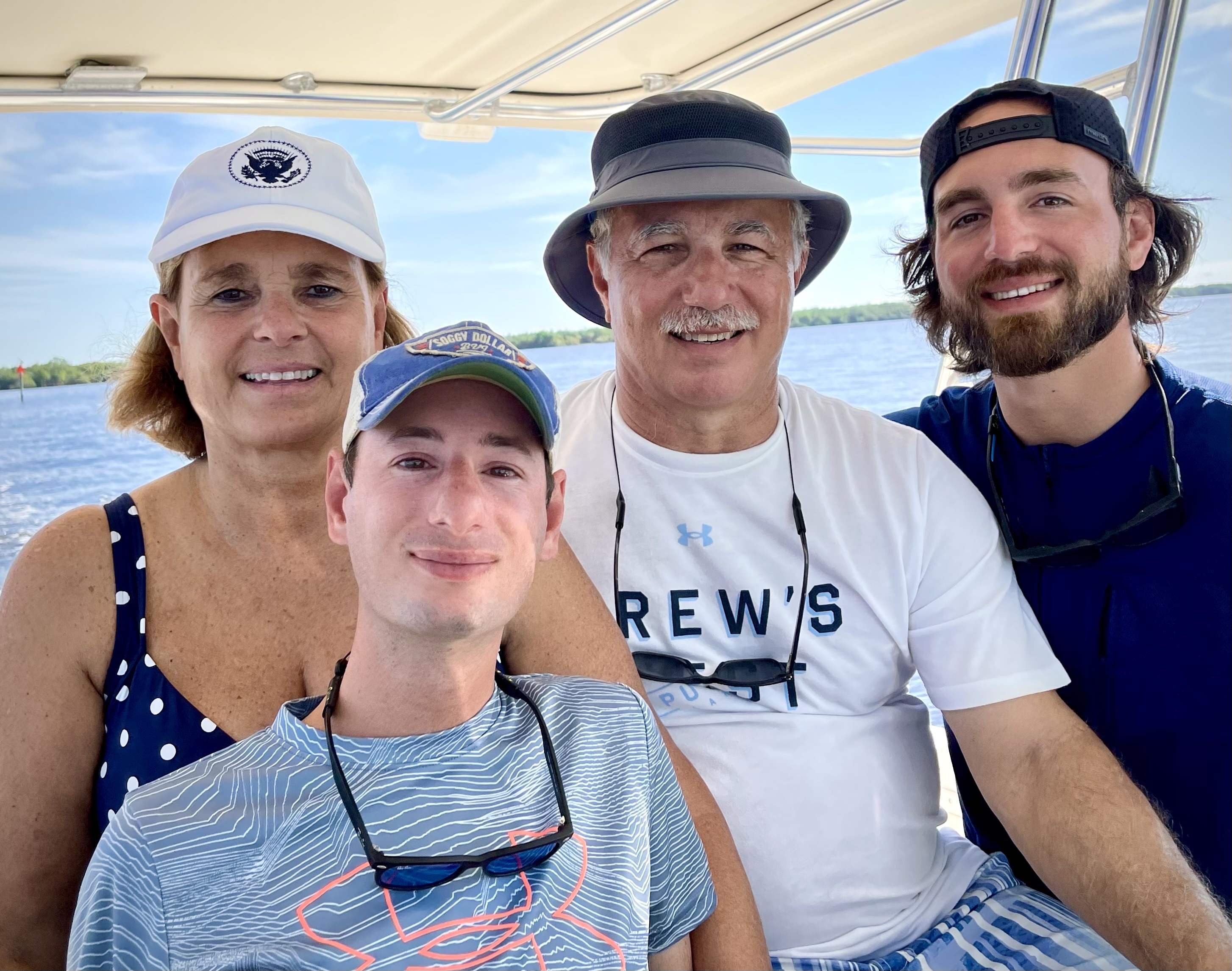 Family on a boat, smiling